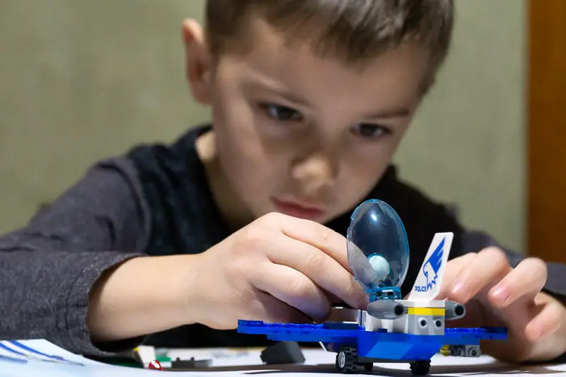 Boy building with Legos