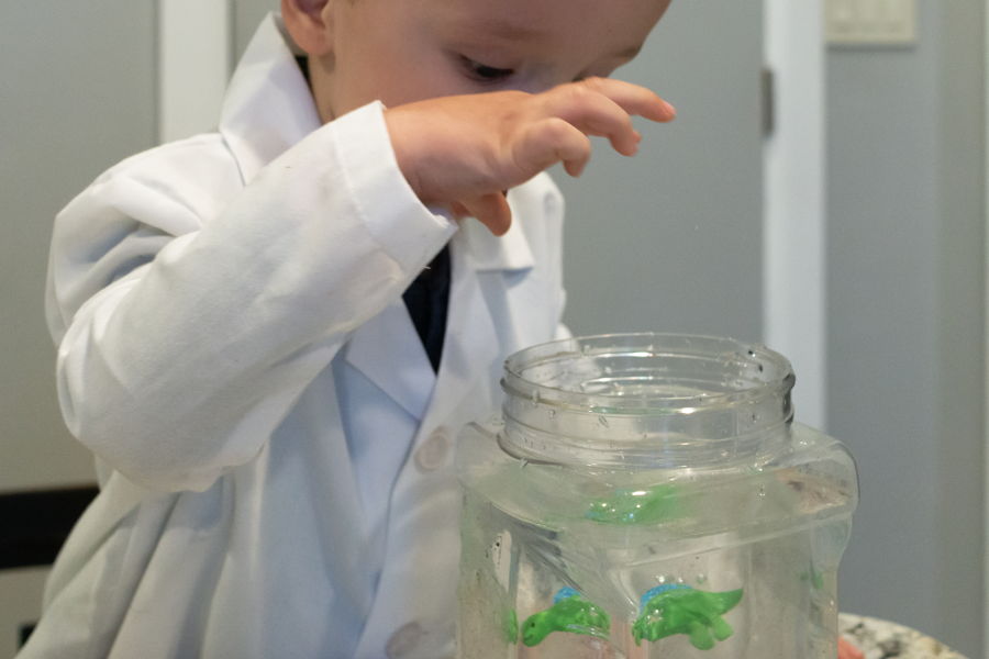 Preschooler doing science experiment