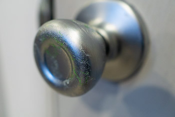 Gross Science Experiment Glitter Germs on a doorknob