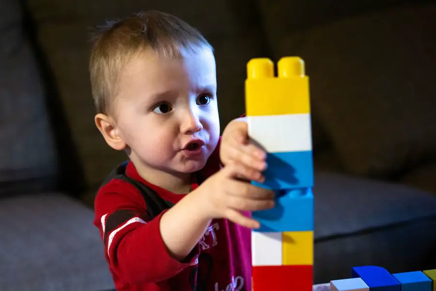 Toddler playing with Mega Bloks STEM Building Toy