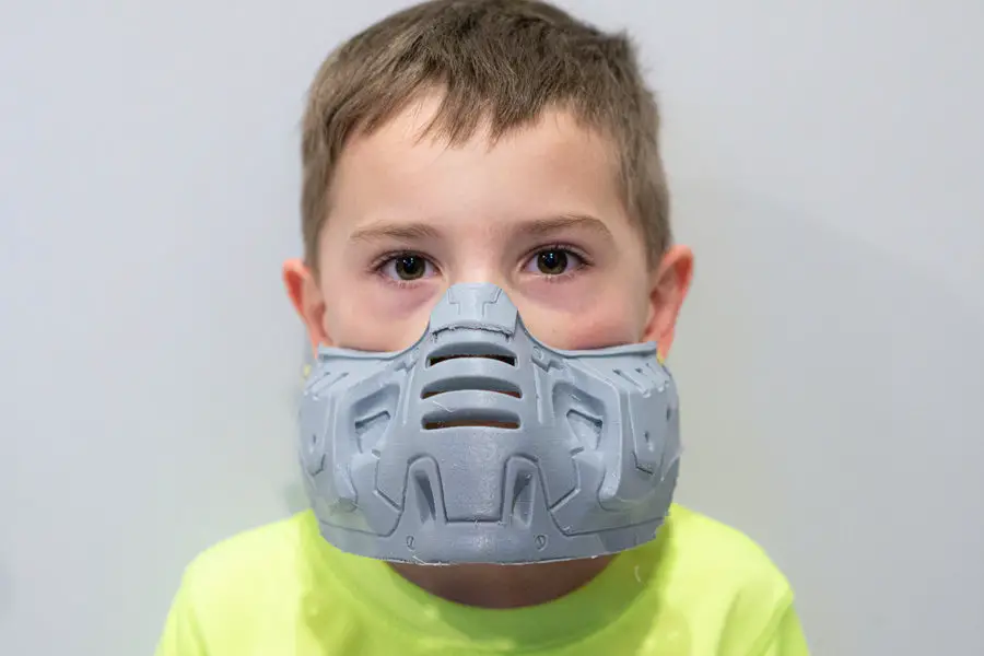 Boy wearing 3D printed face mask