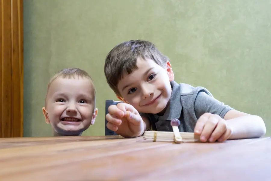 Kids Ready to Launch a Popsicle Stick Catapult