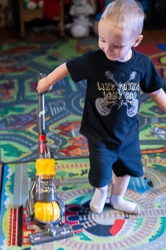 Toddler with Toy Vacuum